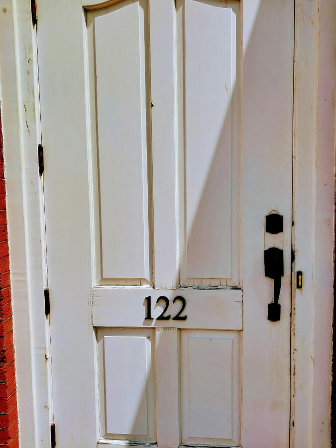 Door to Keeler Building, where Upper Level Bookkeeping offers bookkeeping to Tulsa and Bartlesville, and all 50 states.